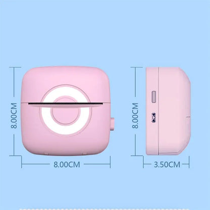 Pink electronic device with dimensions labeled on a blue background