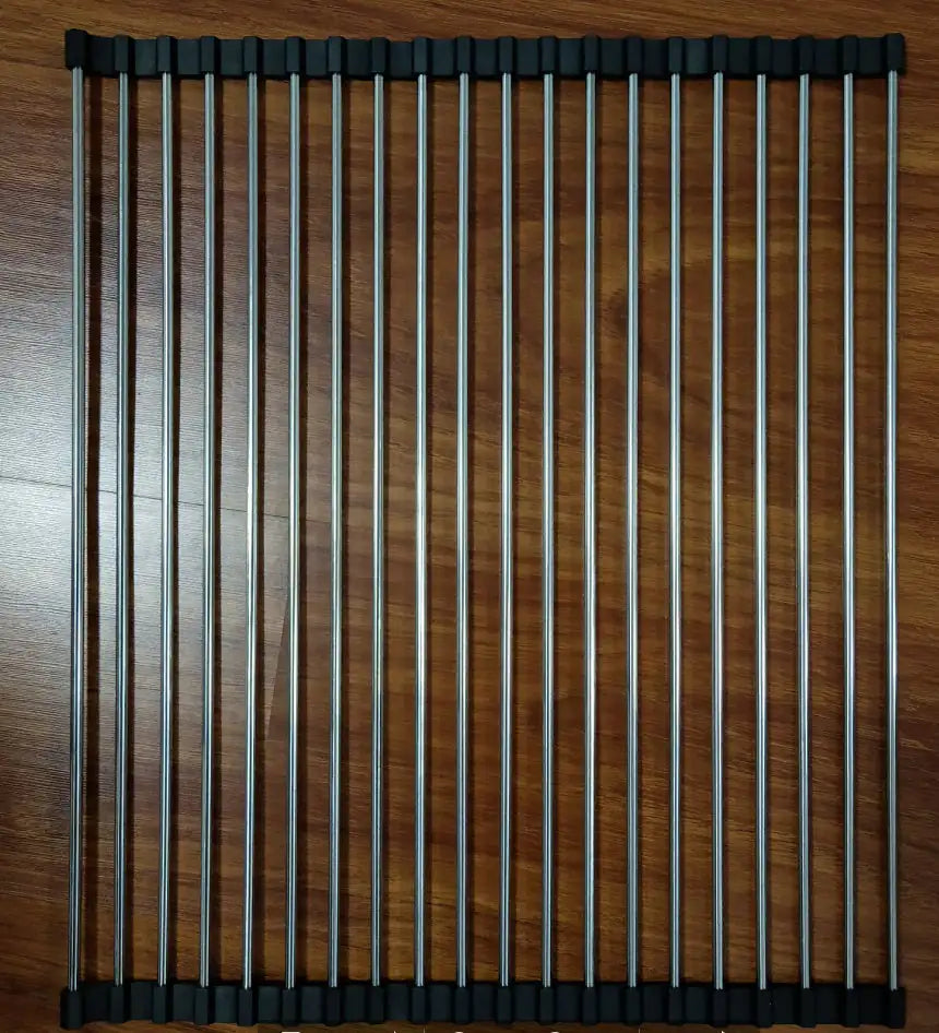 Metal grill on a wooden surface